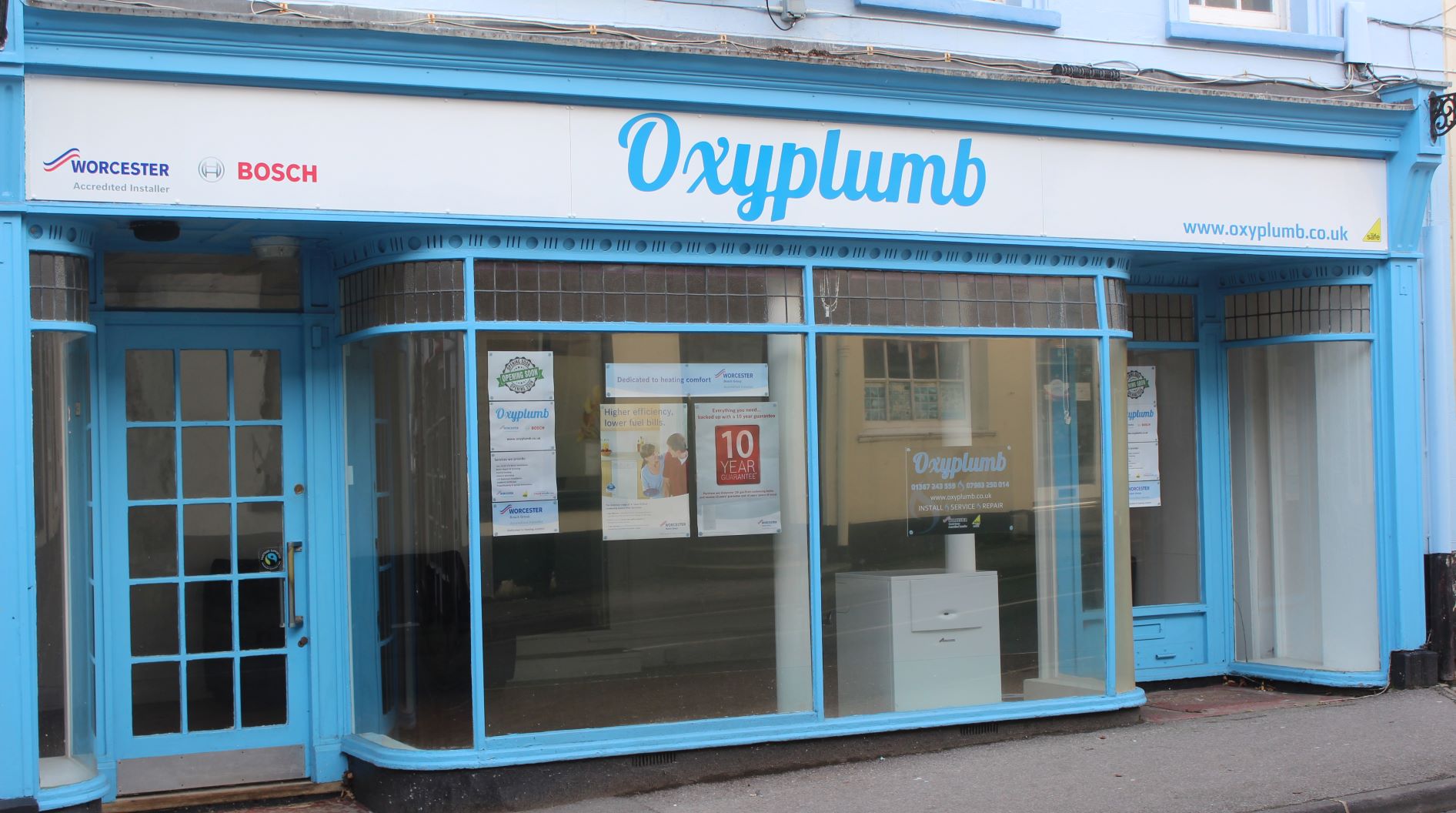 Oxyplumb Shop Sign